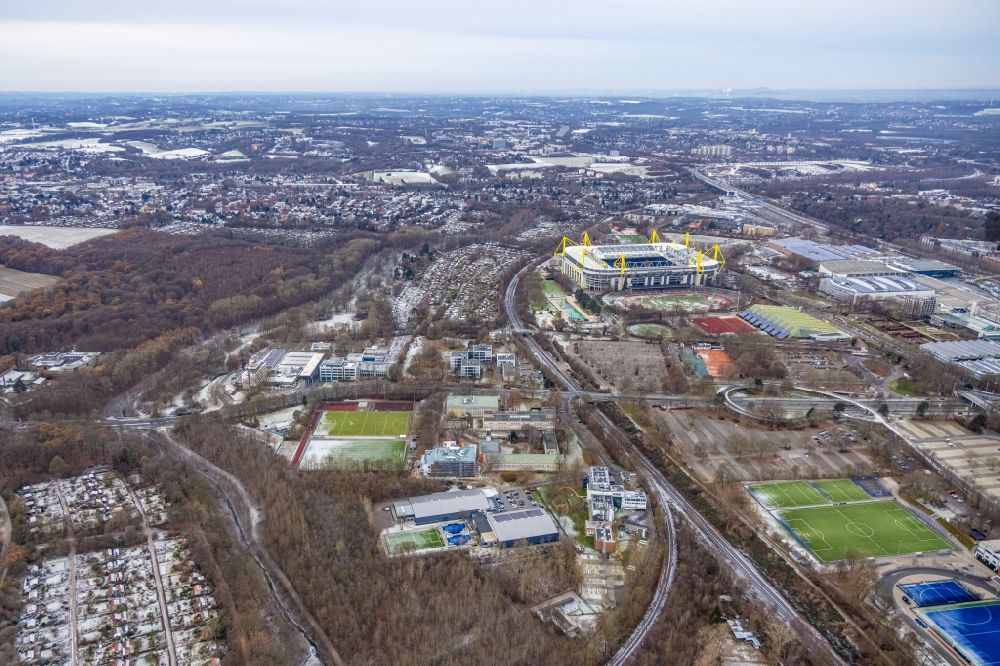 Aerial image Dortmund - Wintry snow-covered sports facility grounds of the arena of the BVB - stadium Signal Iduna Park on the street Strobelallee in the district Westfalenhalle in Dortmund in the Ruhr area in the state North Rhine-Westphalia, Germany