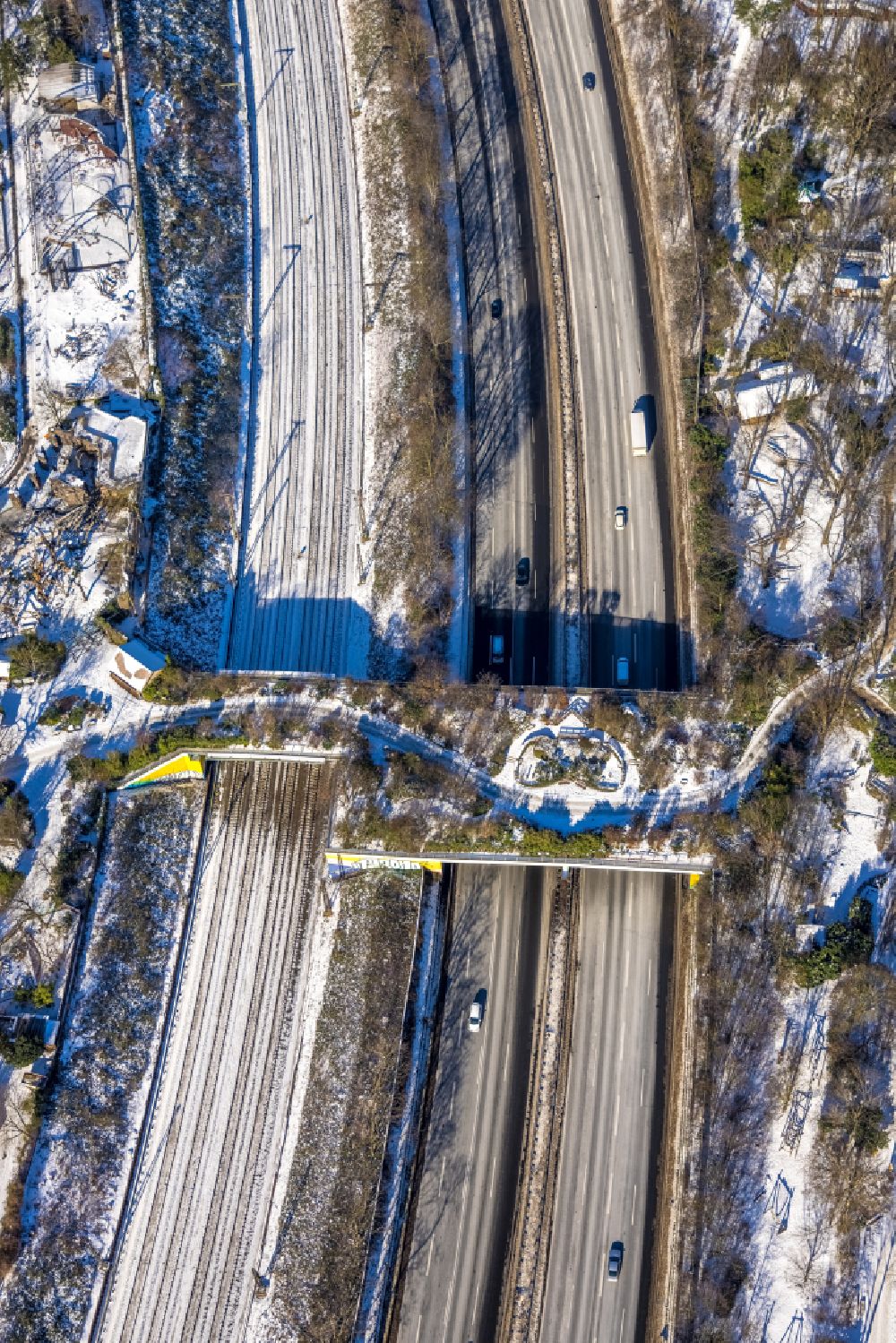 Duisburg from above - Wintry snowy Bridge of a wildlife bridge designed as a green bridge - wildlife crossing bridge over the motorway BAB A3 in the district Duissern in Duisburg in the state North Rhine-Westphalia, Germany