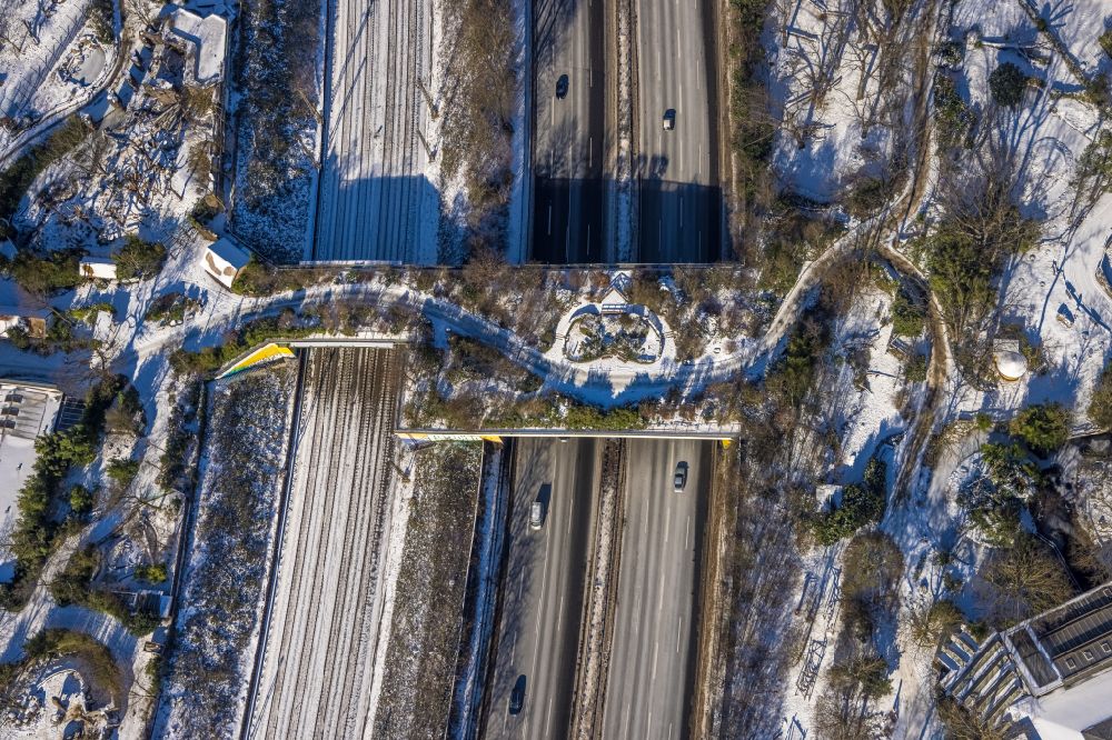 Duisburg from the bird's eye view: Wintry snowy Bridge of a wildlife bridge designed as a green bridge - wildlife crossing bridge over the motorway BAB A3 in the district Duissern in Duisburg in the state North Rhine-Westphalia, Germany