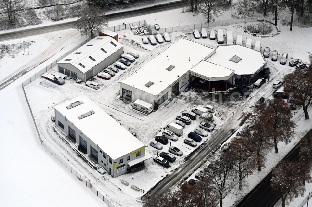 Aerial image Werneuchen - Wintry snowy car dealership building VW Autohaus Hubert Thies on Freienwalder Chaussee in Werneuchen in the state Brandenburg