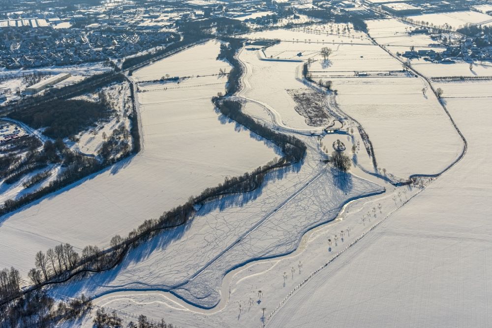 Aerial image Sönnern - Wintry snowy brook and river course from Soennerbach and Salzbach in Soennern in the state North Rhine-Westphalia, Germany
