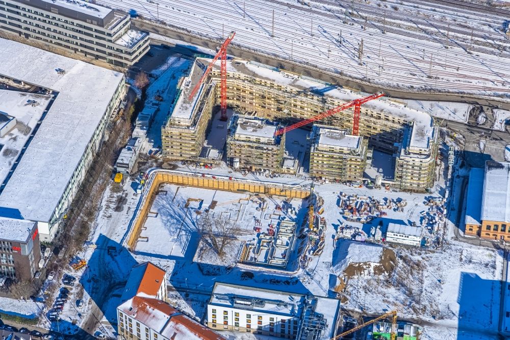 Aerial photograph Düsseldorf - Wintry snowy building site on campus building of Applied Sciences University Duesseldorf - Campus Derendorf on Rather Strasse in the district derendorf in Duesseldorf in North Rhine-Westphalia