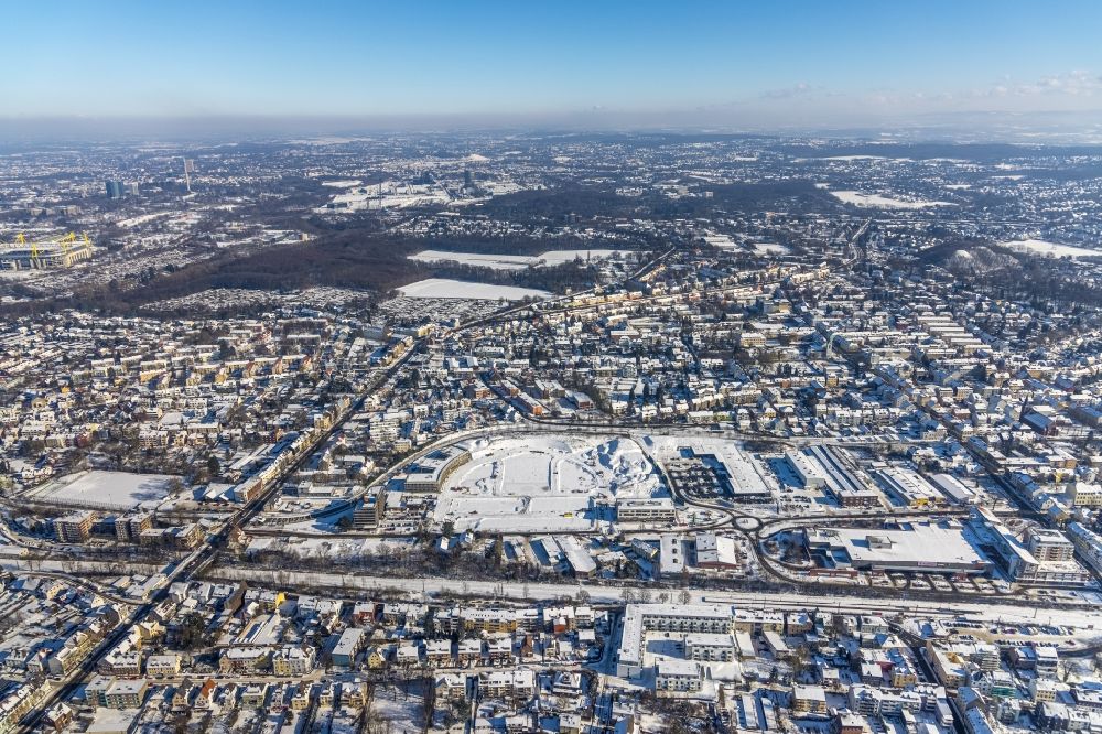 Dortmund from the bird's eye view: Wintry snowy construction site with development works and embankments works in the district Zechenplatz in Dortmund in the state North Rhine-Westphalia, Germany
