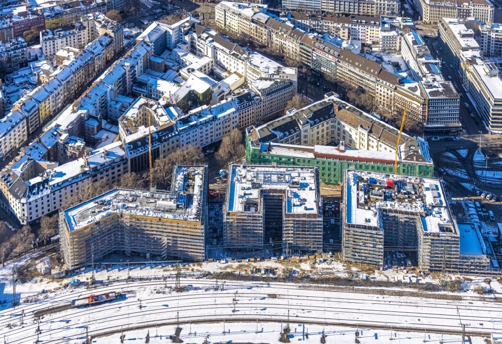 Aerial image Düsseldorf - Wintry snowy new construction site the hotel complex on Harkortstrasse in Duesseldorf in the state North Rhine-Westphalia, Germany