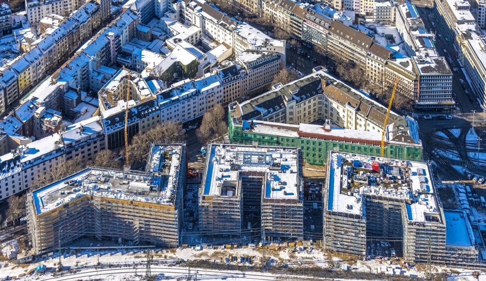 Aerial photograph Düsseldorf - Wintry snowy new construction site the hotel complex on Harkortstrasse in Duesseldorf in the state North Rhine-Westphalia, Germany