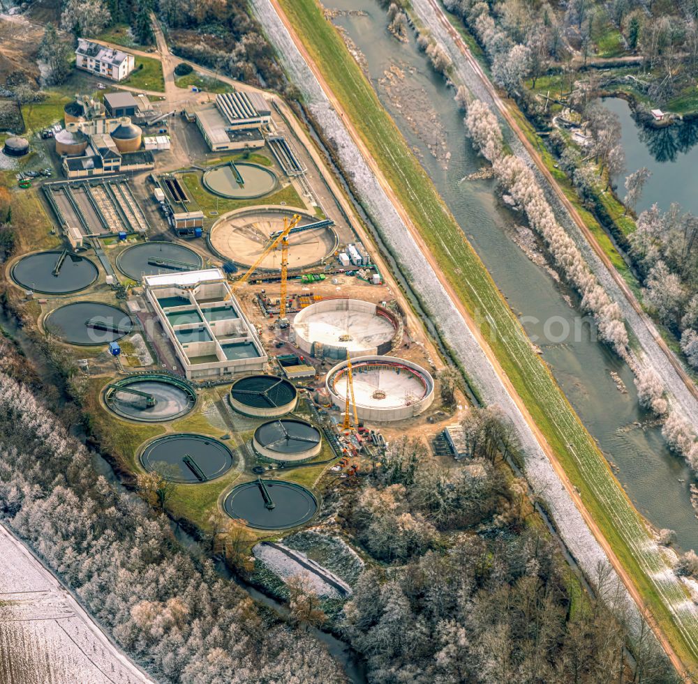 Teningen from the bird's eye view: Wintry snowy sewage works Basin and purification steps for waste water treatment Abwasserverband untere Elz in Teningen in the state Baden-Wurttemberg, Germany