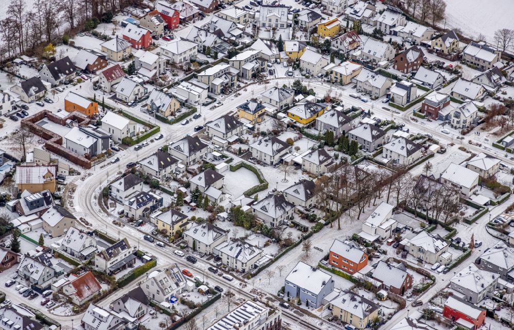 Aerial photograph Dortmund - Wintry snowy residential area construction site of a mixed development with multi-family houses and single-family houses- New building at the Lissaboner Allee - Londoner Bogen in Dortmund at Ruhrgebiet in the state North Rhine-Westphalia, Germany