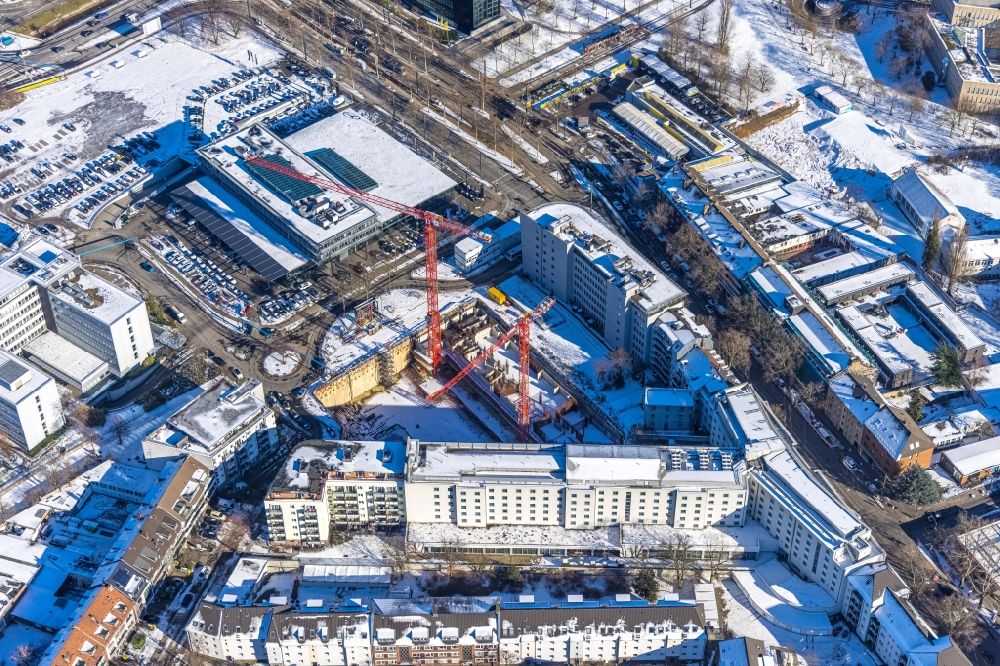 Aerial photograph Düsseldorf - Wintry snowy construction site for new high-rise building complex of UpperNord Tower on Mercedesstrasse in the district Duesseltal in Duesseldorf in the state North Rhine-Westphalia, Germany