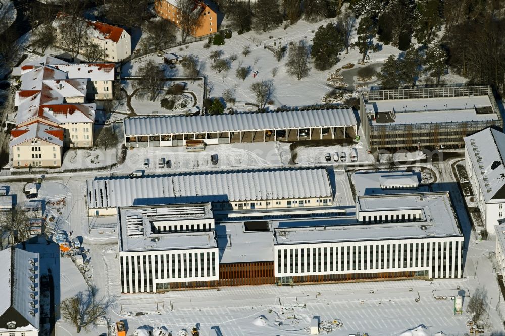Rostock from the bird's eye view: Wintry snowy construction site for the new building of Maritime Operation Center of Deutschen Marine on Kopernikusstrasse in Rostock in the state Mecklenburg - Western Pomerania, Germany