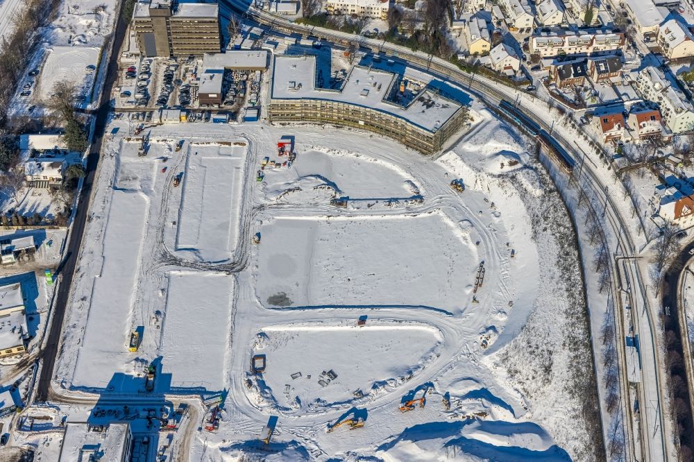 Dortmund from above - Wintry snowy construction site for the multi-family residential building Wohnen on Hombrucher Bogen in the district Zechenplatz in Dortmund in the state North Rhine-Westphalia, Germany
