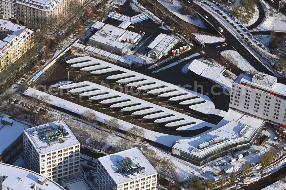 Berlin from above - Wintry snowy new construction site central Bus Station for Public Transportation on Masurenallee in the district Westend in Berlin, Germany
