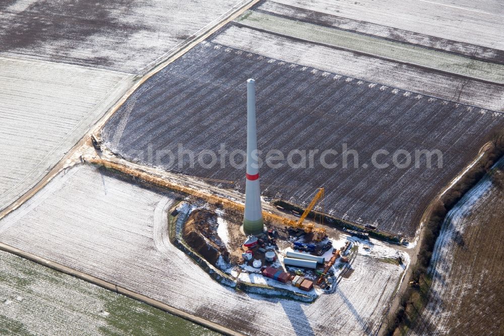Aerial photograph Hatzenbühl - Wintry snowy Construction site for wind turbine installation in Hatzenbuehl in the state Rhineland-Palatinate, Germany
