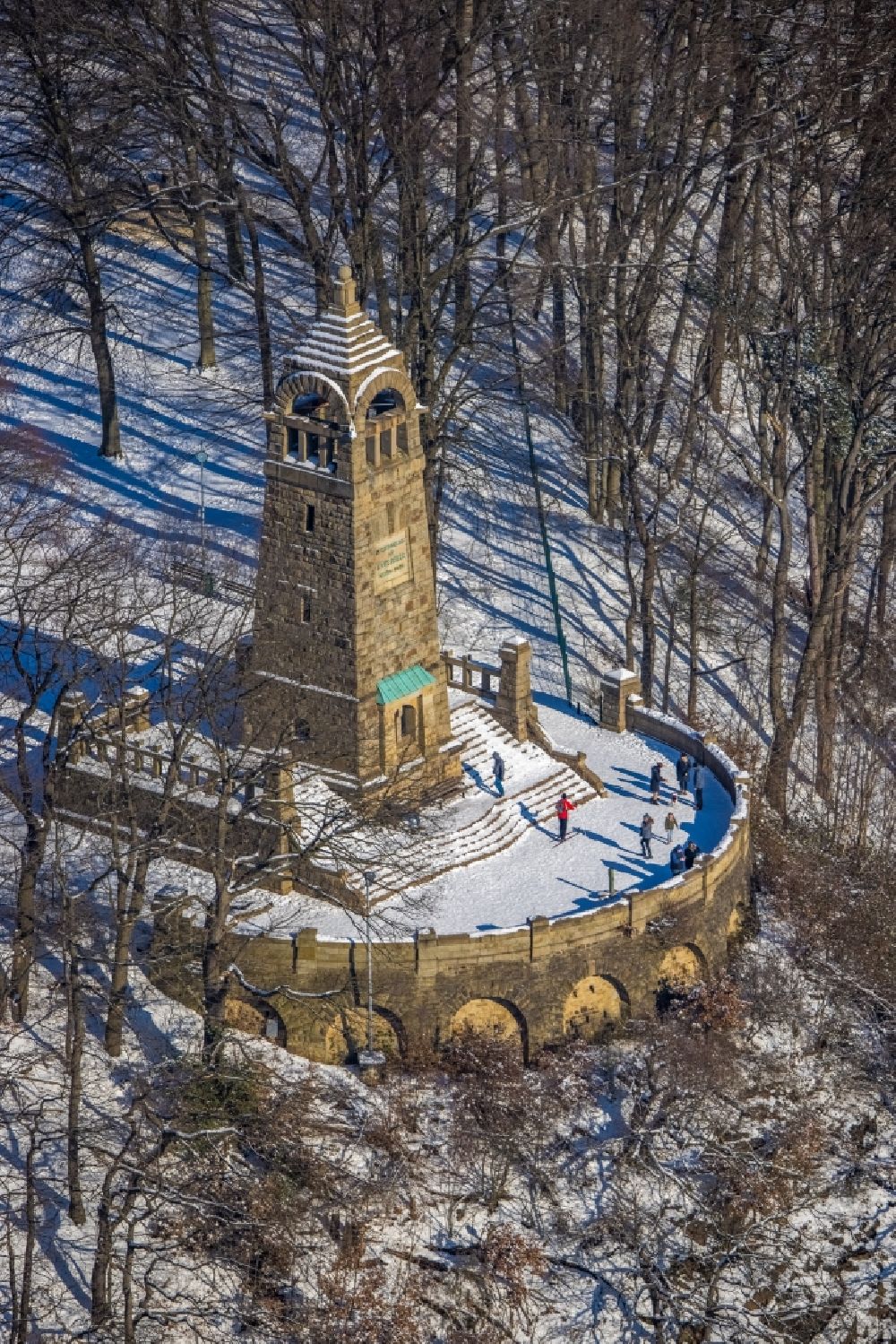 Witten from the bird's eye view: Wintry snowy structure of the observation tower Berger - Denkmal in Witten in the state North Rhine-Westphalia, Germany
