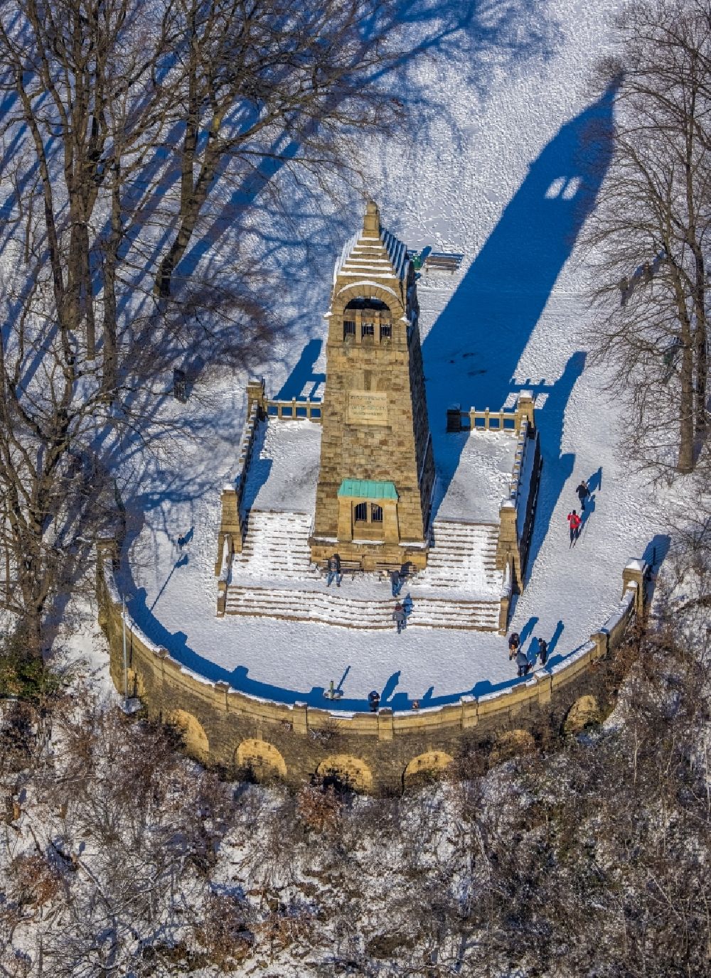 Witten from above - Wintry snowy structure of the observation tower Berger - Denkmal in Witten in the state North Rhine-Westphalia, Germany