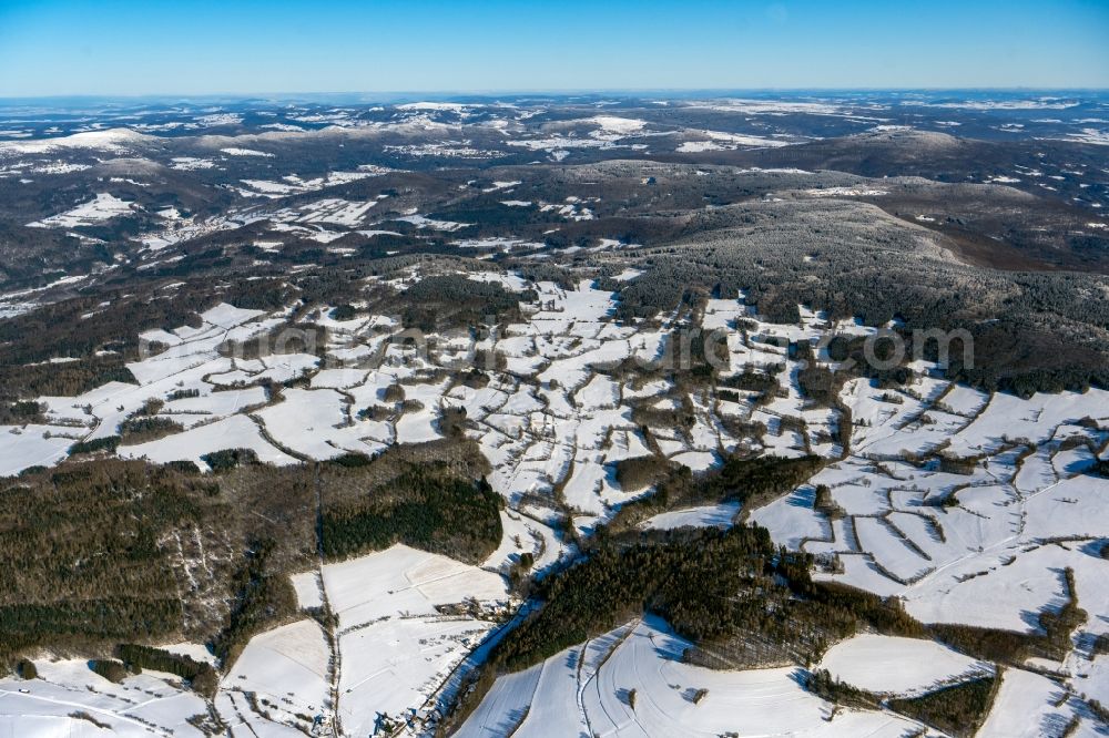 Geroda from the bird's eye view: Wintry snowy mountain and valley landscape and Black Mountains in Geroda in the state Bavaria, Germany