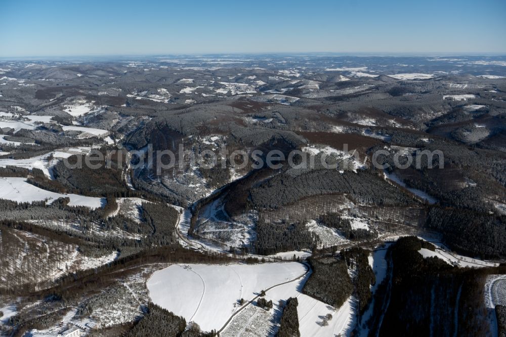 Hoheleye from above - Wintry snowy valley landscape surrounded by mountains in Hoheleye at Siegerland in the state North Rhine-Westphalia, Germany