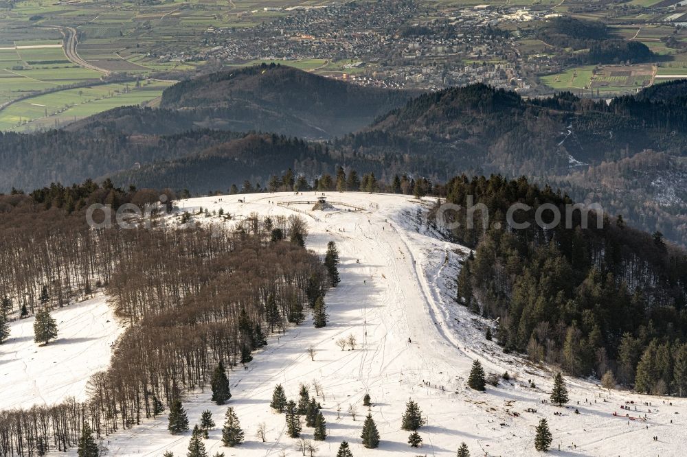 Aerial image Waldkirch - Wintry snowy rock and mountain landscape Berggipfel of Kandel in Waldkirch in the state Baden-Wurttemberg, Germany