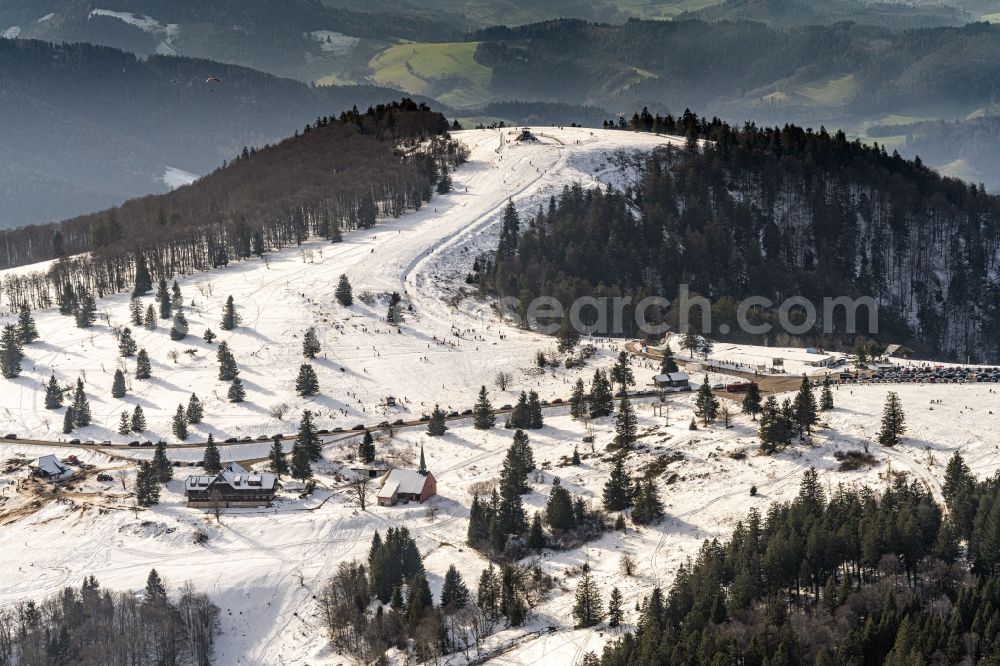 Aerial photograph Waldkirch - Wintry snowy rock and mountain landscape Berggipfel of Kandel in Waldkirch in the state Baden-Wurttemberg, Germany
