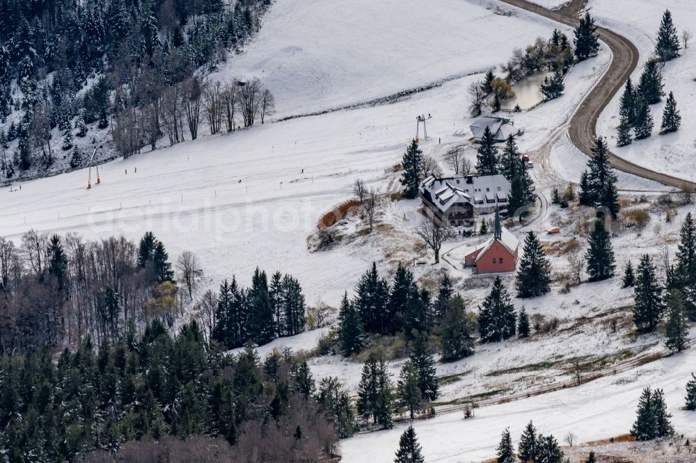 Aerial image Waldkirch - Wintry snowy rock and mountain landscape of Kandel in Waldkirch in the state Baden-Wurttemberg, Germany