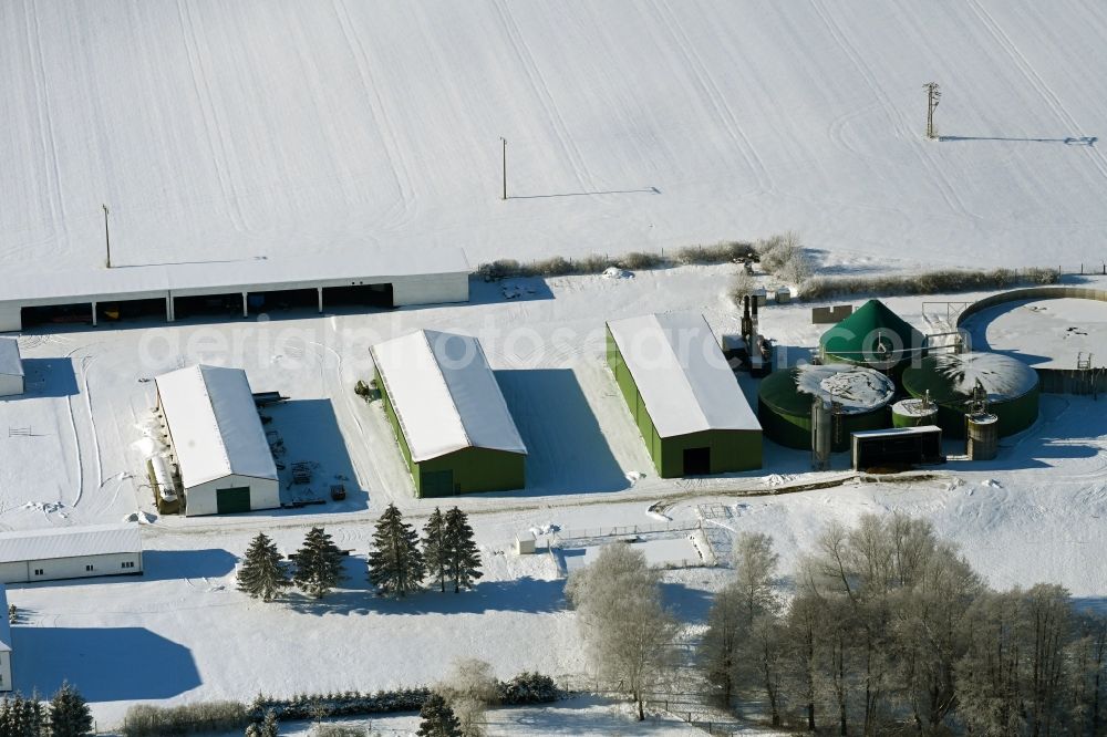 Aerial photograph Rehberg - Wintry snowy biogas storage tank in biogas park on Birkenweg in Rehberg in the state Mecklenburg - Western Pomerania, Germany