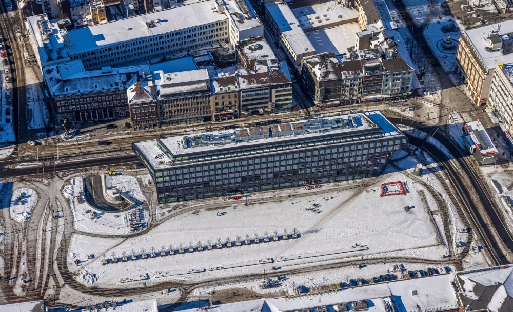 Duisburg from the bird's eye view: Wintry snowy office building Mercator One on Mercatorstrasse in Duisburg in the state North Rhine-Westphalia, Germany