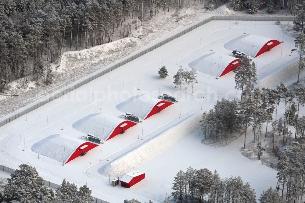 Aerial image Biesenthal - Wintry snowy bunker complex and munitions depot on the military training grounds the police on street Finower Chaussee in Biesenthal in the state Brandenburg, Germany