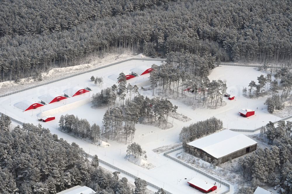 Aerial photograph Biesenthal - Wintry snowy bunker complex and munitions depot on the military training grounds the police on street Finower Chaussee in Biesenthal in the state Brandenburg, Germany