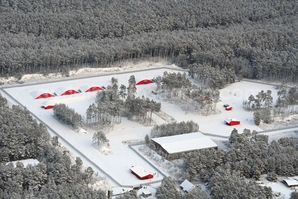 Biesenthal from above - Wintry snowy bunker complex and munitions depot on the military training grounds the police on street Finower Chaussee in Biesenthal in the state Brandenburg, Germany
