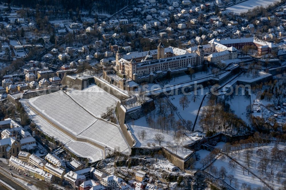 Aerial image Würzburg - Wintry snowy castle of the fortress Festung Marienberg in the district Zellerau in Wuerzburg in the state Bavaria, Germany