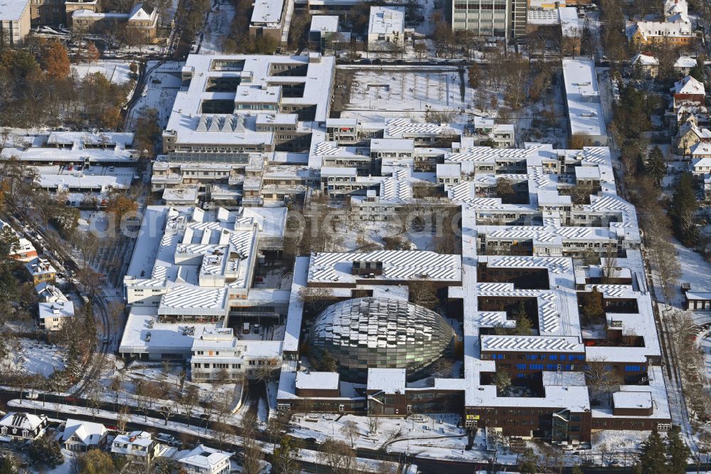 Berlin from above - Wintry snowy campus building of the university Freie Universitaet Berlin with the building of the Philological Library in the Habelschwerdter Allee in the district Dahlem in Berlin