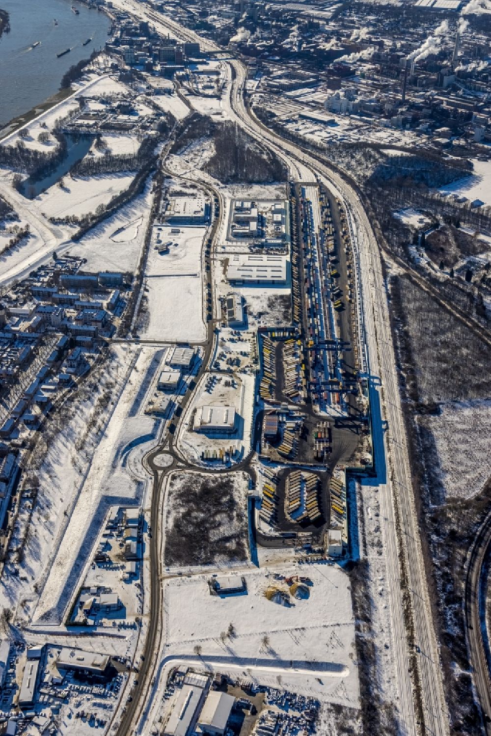 Duisburg from the bird's eye view: Wintry snowy container terminal center in Duisburg at Ruhrgebiet in the state North Rhine-Westphalia, Germany