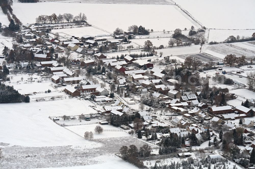 Danewitz from above - Wintry snowy village view in Danewitz in the state Brandenburg, Germany