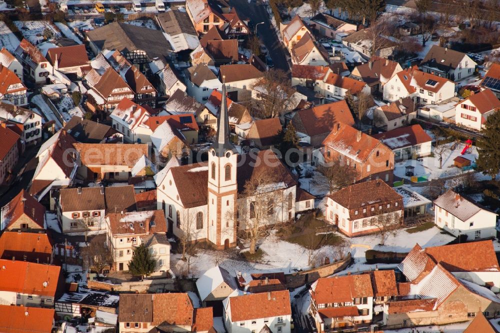 Göcklingen from the bird's eye view: Wintry snowy Village view in Goecklingen in the state Rhineland-Palatinate, Germany