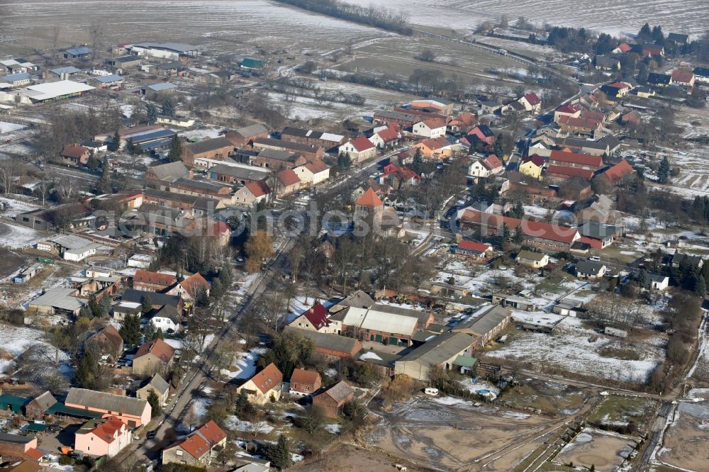 Weesow from the bird's eye view: Wintry snowy Village view in Weesow in the state Brandenburg