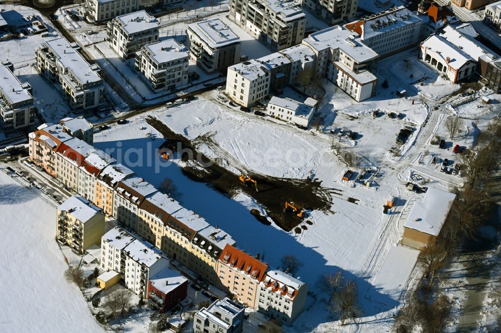 Aerial photograph Rostock - Wintry snowy development area of industrial wasteland on Neue Bleicherstrsse in Rostock in the state Mecklenburg - Western Pomerania, Germany