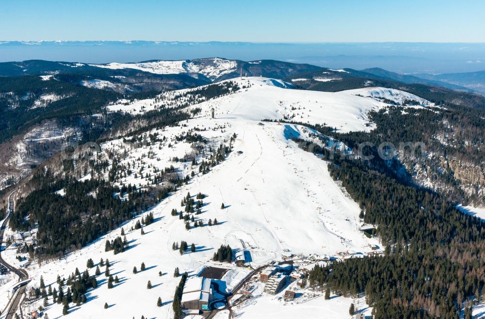 Feldberg (Schwarzwald) from above - Wintry snowy Rock and mountain landscape and Lifts in ski resort in Feldberg (Schwarzwald) in the state Baden-Wuerttemberg, Germany