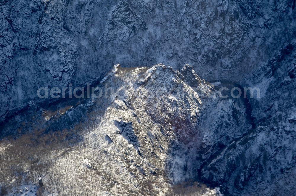 Aerial photograph Thale - Wintry snowy rock and mountain landscape Rosstrappe in Thale in the Harz in the state Saxony-Anhalt, Germany