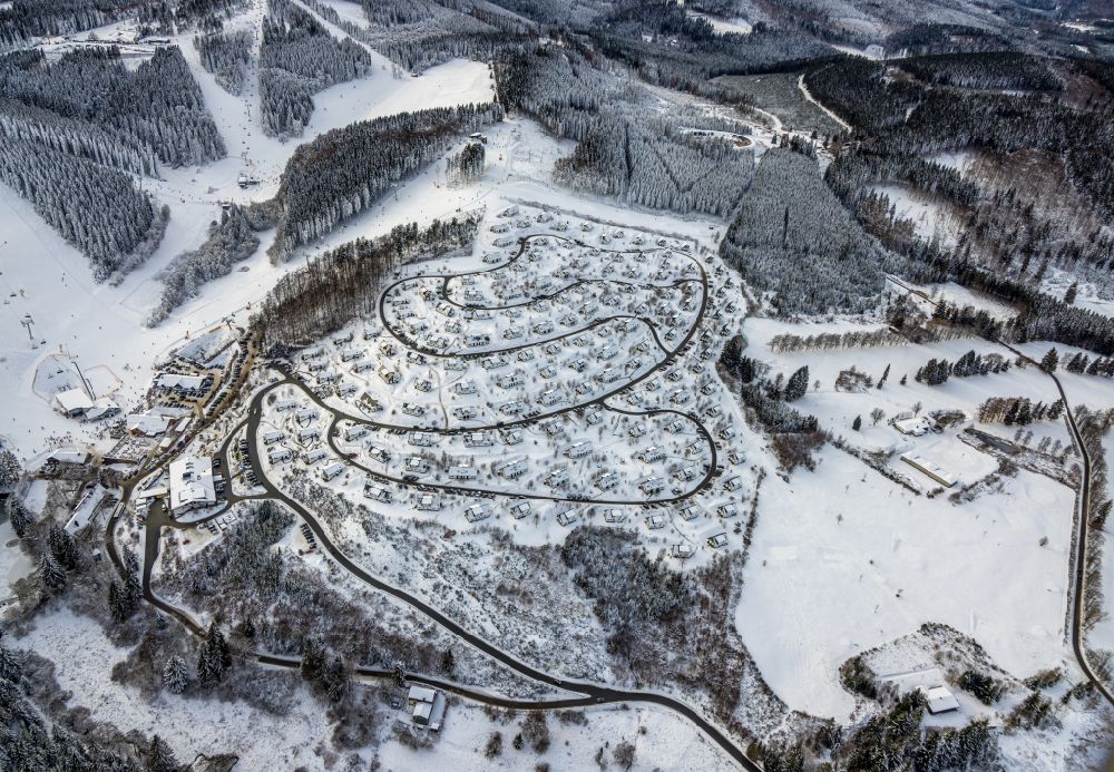 Aerial image Winterberg - Wintry snowy holiday house plant of the park Landal Winterberg In of Buere in Winterberg on Sauerland in the state North Rhine-Westphalia, Germany
