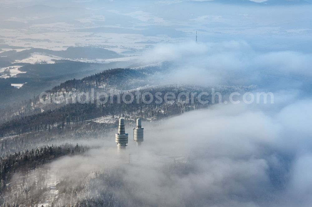 Rimbach from the bird's eye view: Snow-capped, the telecommunications towers tower on the Hohe Bogen in Rimbach in the state of Bavaria, Germany. The former NATO interception system Fernmeldesektor F is today a publicly accessible observation tower in the Bavarian Forest