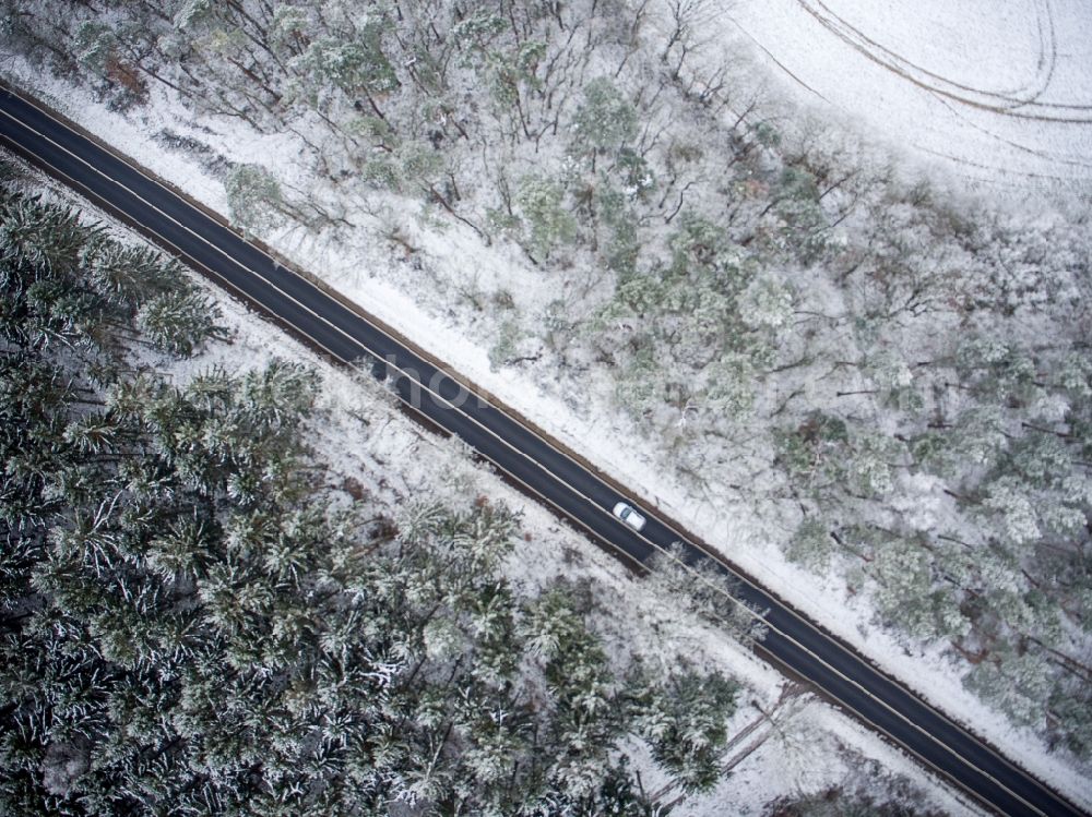 Gadebusch from the bird's eye view: Wintry snowy routing and lanes along the trunk road - federal motorway B 104 in Gadebusch in the state Mecklenburg - Western Pomerania, Germany