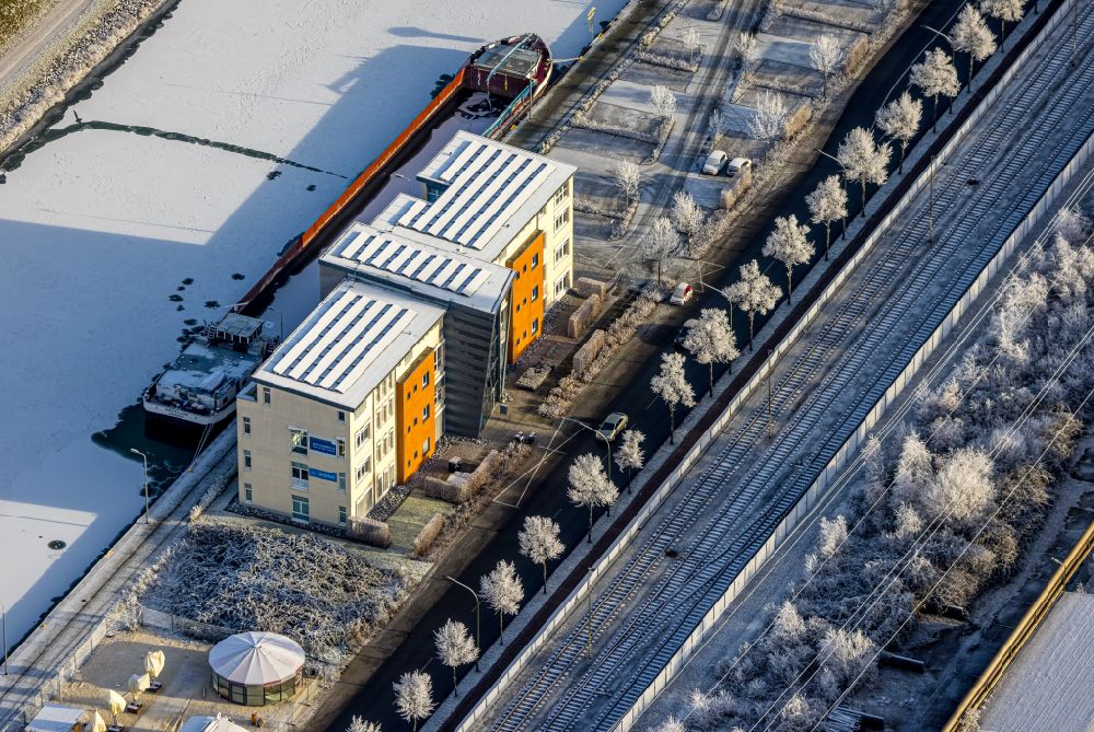Hamm from the bird's eye view: Wintry snowy company grounds and facilities of Randstad Hamm on street Hafenstrasse in Hamm at Ruhrgebiet in the state North Rhine-Westphalia, Germany