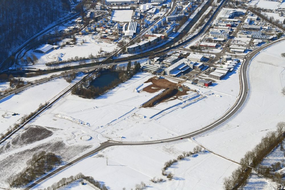 Aerial photograph Lörrach - Wintry snowy open landscape and construction works of the new hospital of the administrative district Loerrach in the district Hauingen in Loerrach in the state Baden-Wurttemberg, Germany