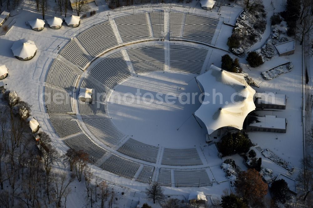 Berlin from above - Wintry snowy Construction of the building of the open-air theater Kindl-Buehne Wuhlheide in Berlin in Germany