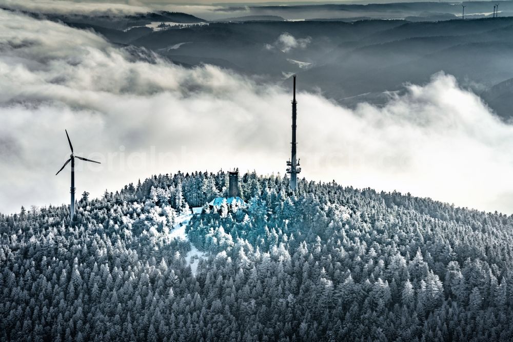 Aerial image Oberharmersbach - Wintry snowy radio tower and transmitter on the crest of the mountain range Am Brandenkopf in Oberharmersbach in the state Baden-Wurttemberg, Germany
