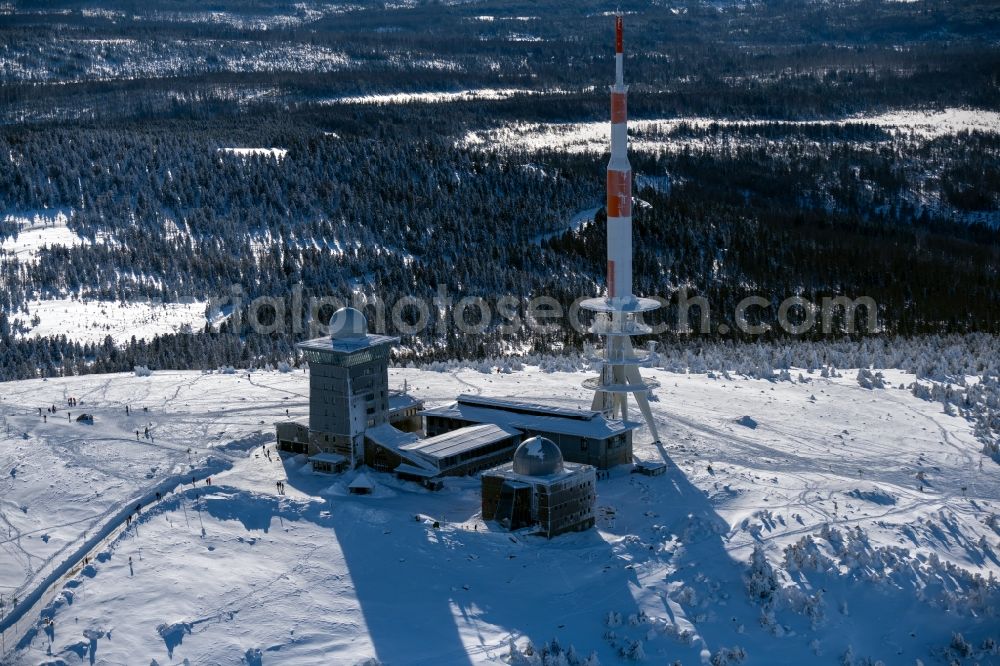 Schierke from above - Wintry snowy radio tower and transmitter on the crest of the mountain range Brocken in Harz in Schierke in the state Saxony-Anhalt, Germany
