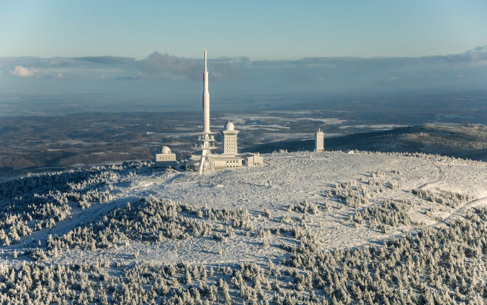 Schierke from above - Wintry snowy radio tower and transmitter on the crest of the mountain range Brocken in Harz in Schierke in the state Saxony-Anhalt, Germany