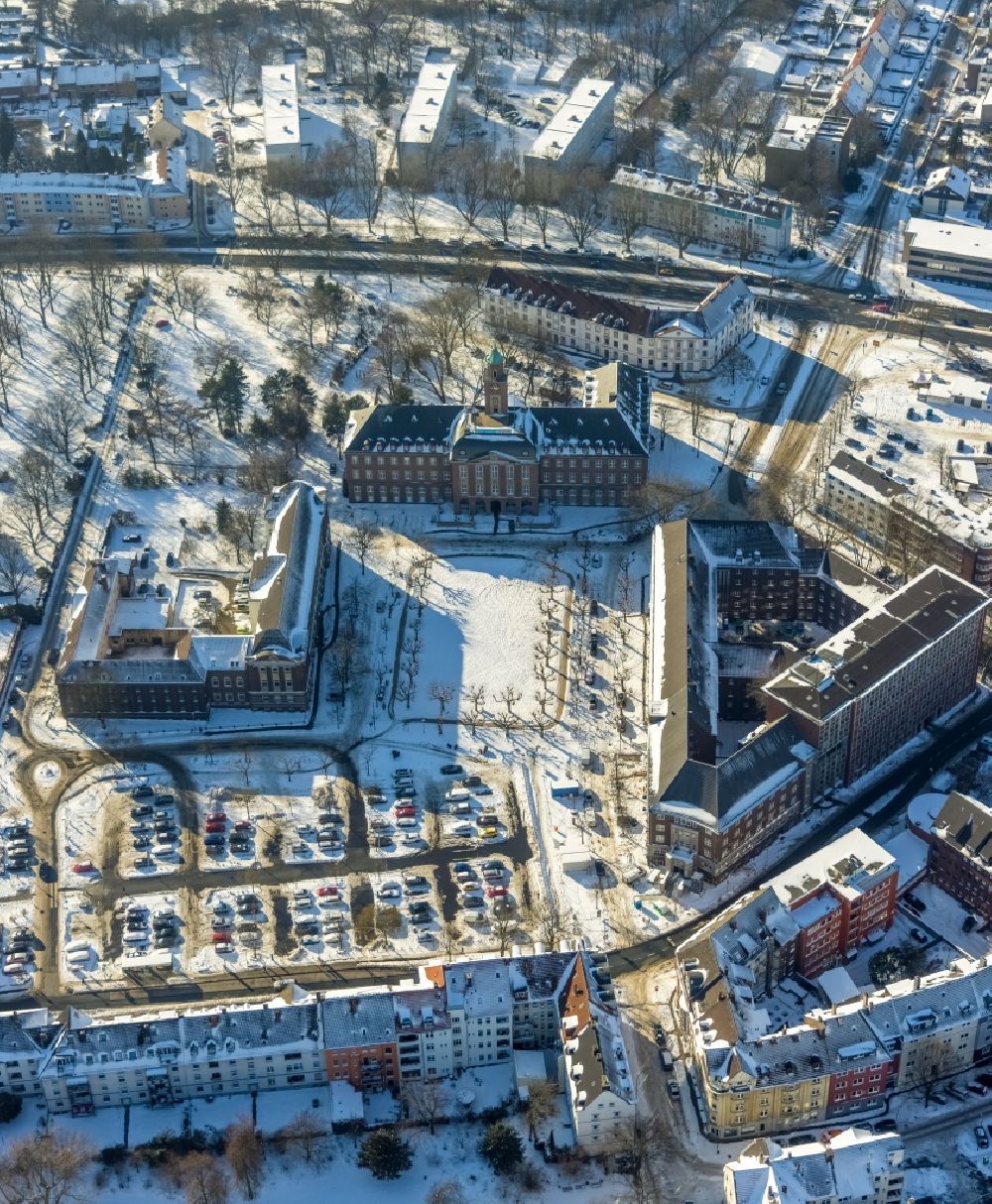 Herne from the bird's eye view: Wintry snowy town Hall building of the city administration on Friedrich-Ebert-Platz in Herne at Ruhrgebiet in the state North Rhine-Westphalia, Germany