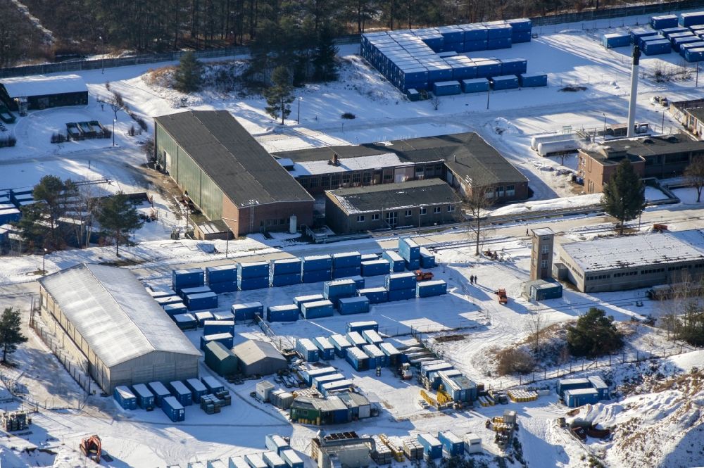 Aerial image Rheinsberg - Wintry snowy building the decommissioned reactor units and systems of the NPP - NPP nuclear power plant in Rheinsberg in the state Brandenburg, Germany