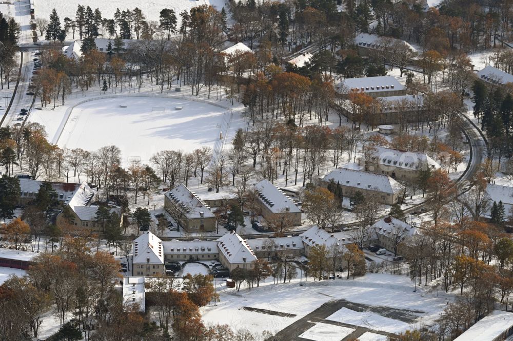 Berlin from the bird's eye view: Wintry snowy building complex of the German army - Bundeswehr military barracks Julius-Leber-Kaserne on Kurt-Schumacher-Donm in the district Tegel in Berlin, Germany