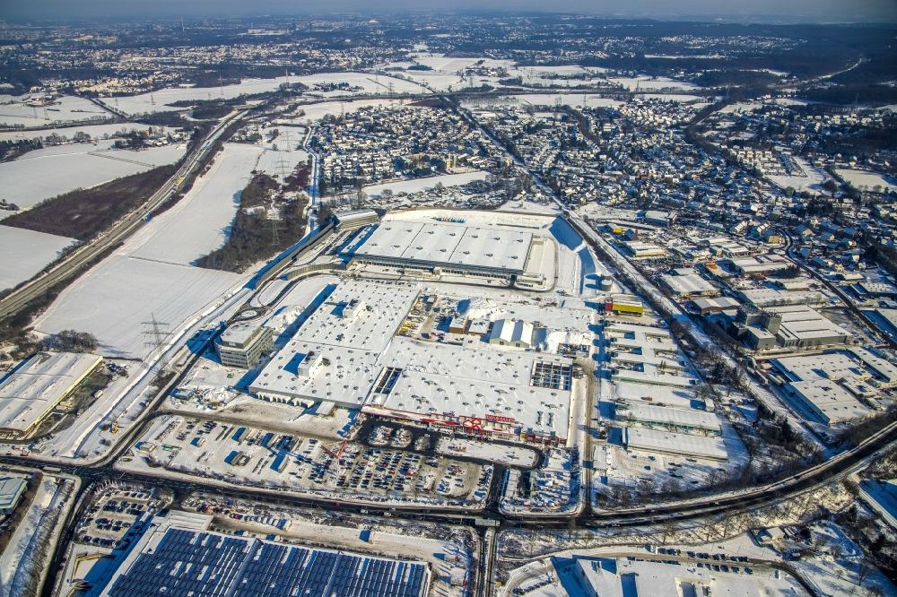 Aerial image Witten - Wintry snowy building complex and grounds of the logistics center with a new Amazon building on Menglinghauser Strasse - Siemensstrasse in the district Ruedinghausen in Witten at Ruhrgebiet in the state North Rhine-Westphalia, Germany